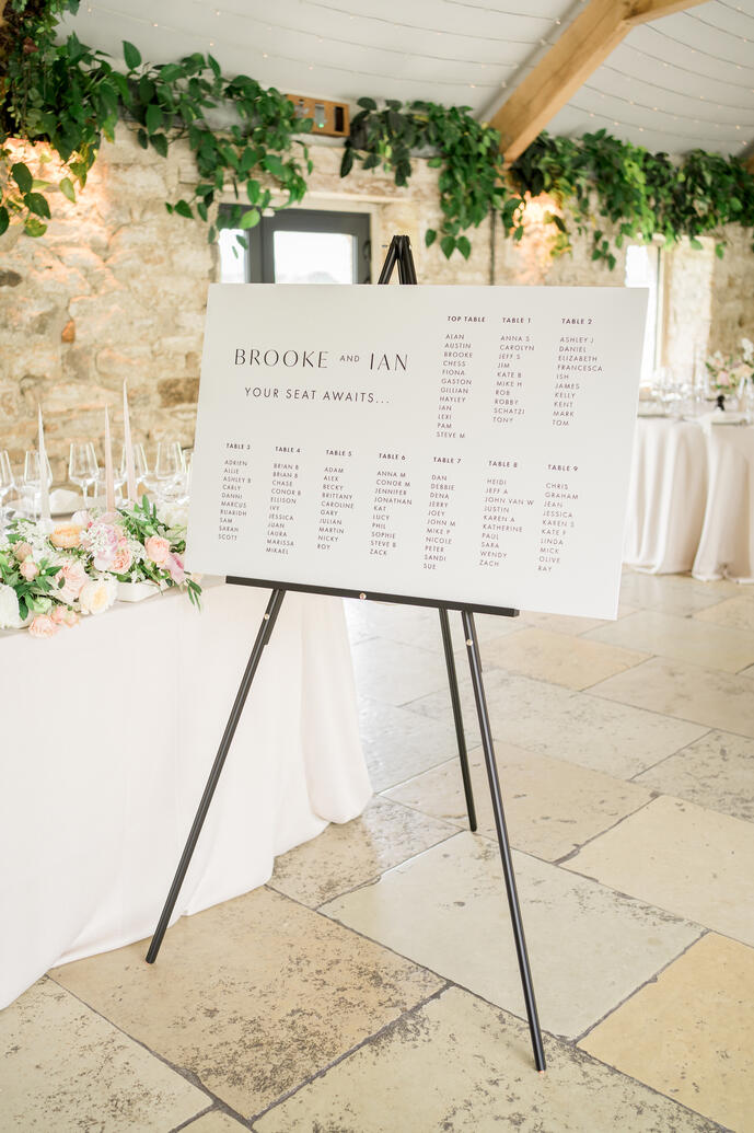 Monochrome table plan on a black easel
